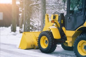 A Wheel loader removing snow